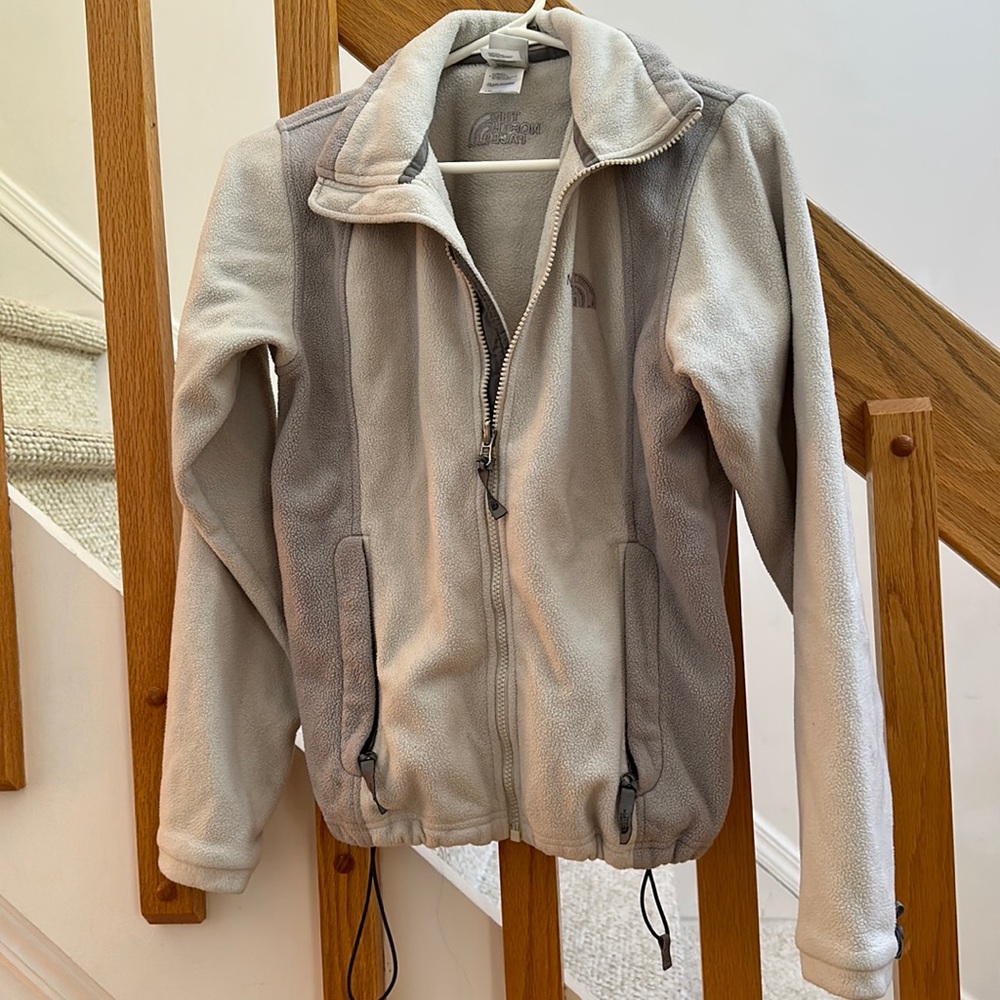 The North Face fleet jacket, size small, silver and grey. Full zipper up.